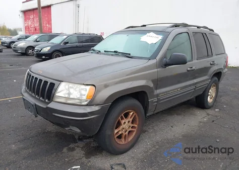 1999 Jeep Grand Cherokee Limited from USA, damaged, VIN 1J4GW68N2XC597168